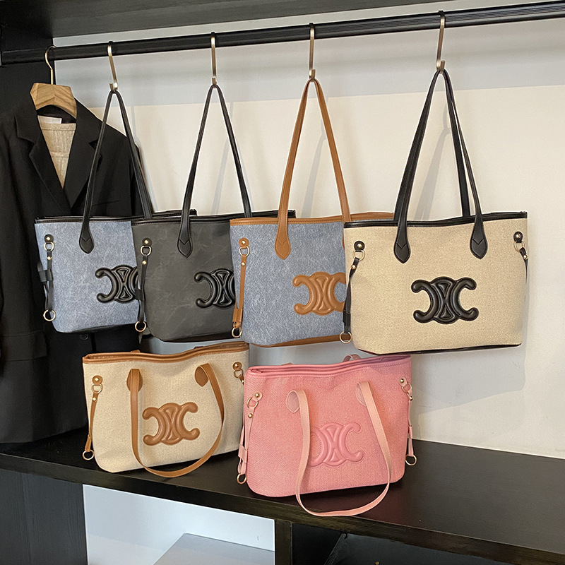 O1CN01E7frYe1X6LLhYLMJ7_!!2209708732874-0-cib Olivia tote bag - Image 1