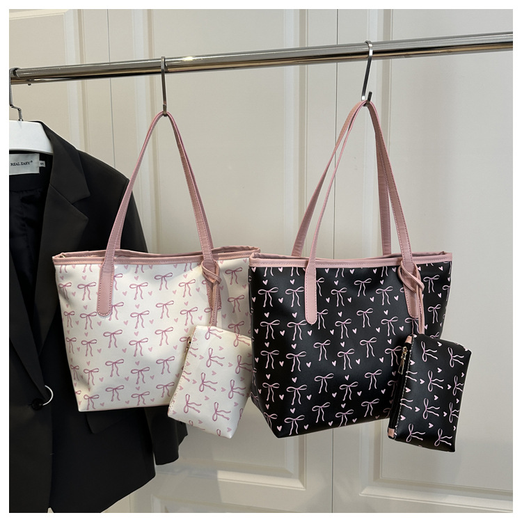 O1CN01APmjA21X6LLc8oNHi_!!2209708732874-0-cib Ribbon tote bag - Image 1